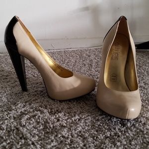 Tan and black pumps